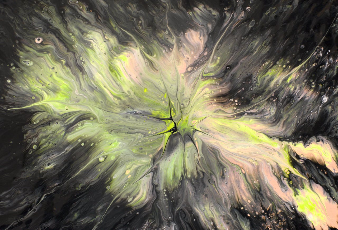 Captivating abstract fluid art with striking yellow and green hues against a dark background.