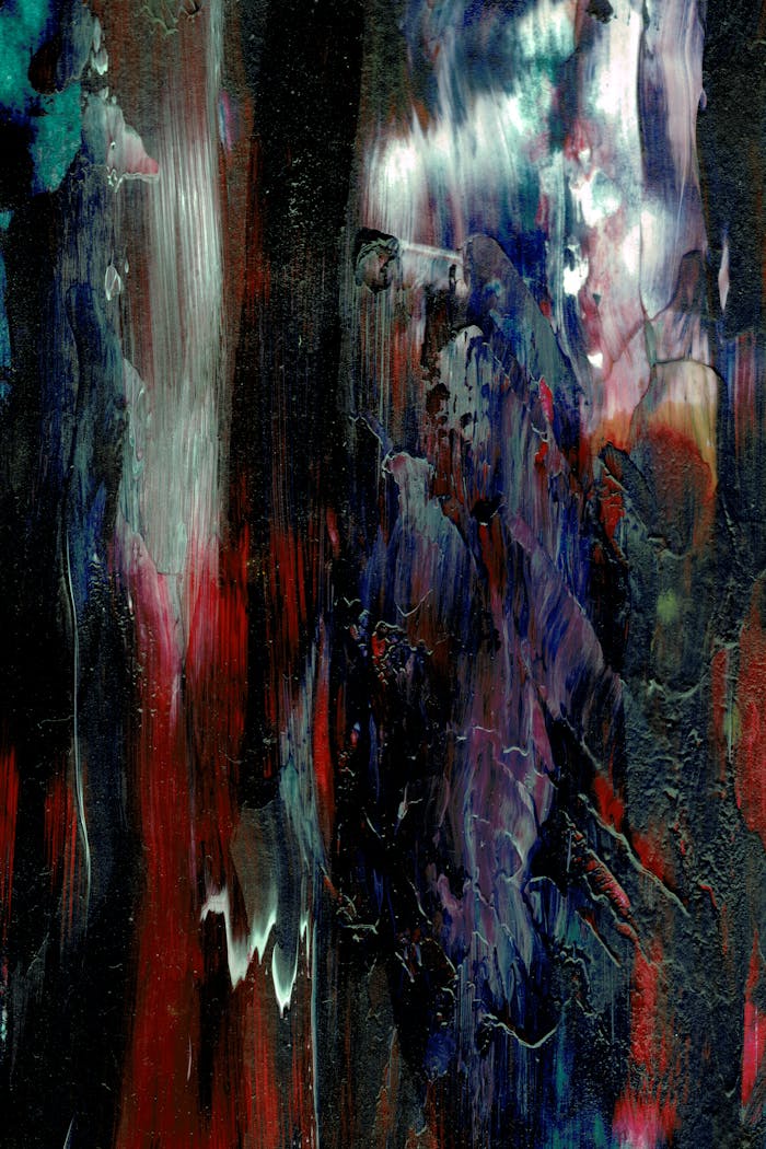 Dynamic and colorful abstract acrylic painting showcasing rich textures and vibrant layers.